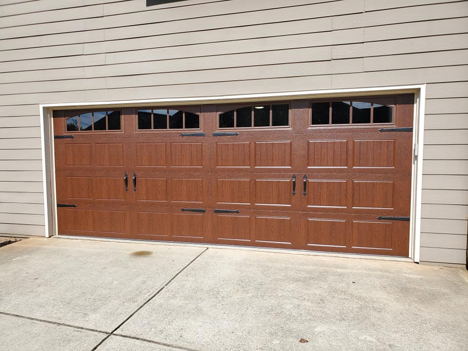 Stamped Carriage in Walnut color and Stockbridge windows